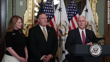 U.S. Vice President Mike Pence (R) speaks as Mike Pompeo (2nd L) and wife Susan Pompeo (L) look on during a swearing in ceremony for Pompeo to become CIA Director at Eisenhower Executive Office Building January 23, 2017 in Washington, DC. Pompeo was confirmed for the position by the Senate this evening.  (Alex Wong/Getty Images)